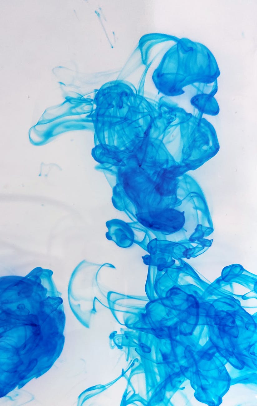 blue abstract background with wavy lines on white surface