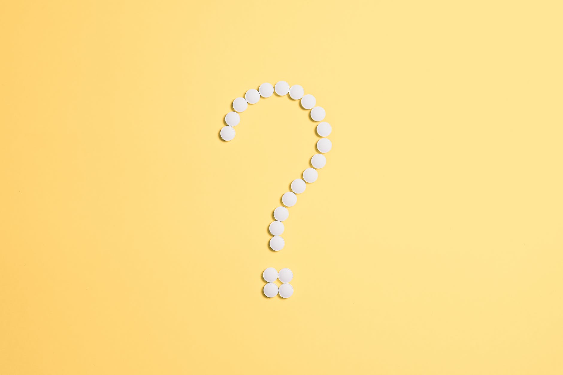 pills fixed as question mark sign