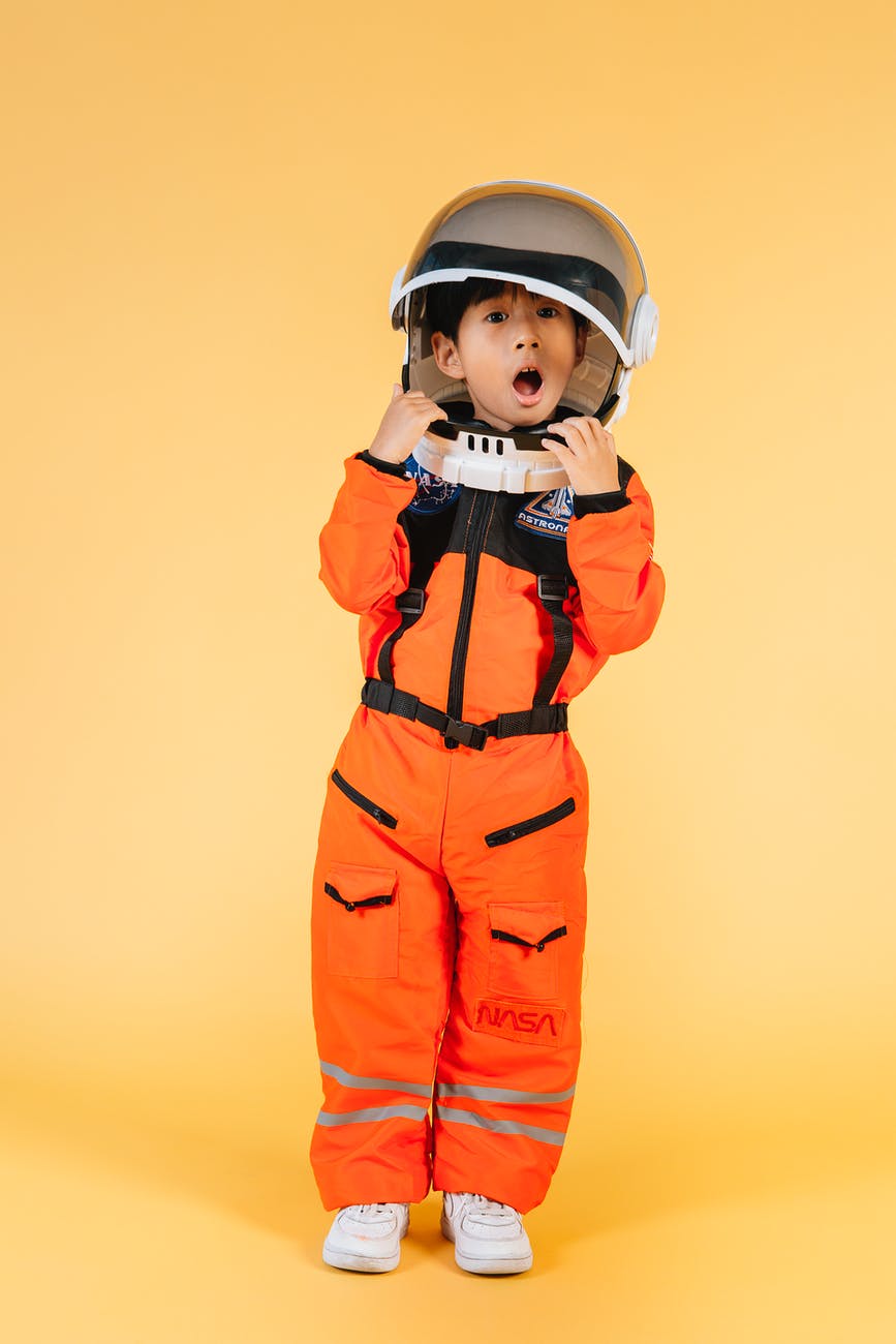 little ethnic boy in space suit