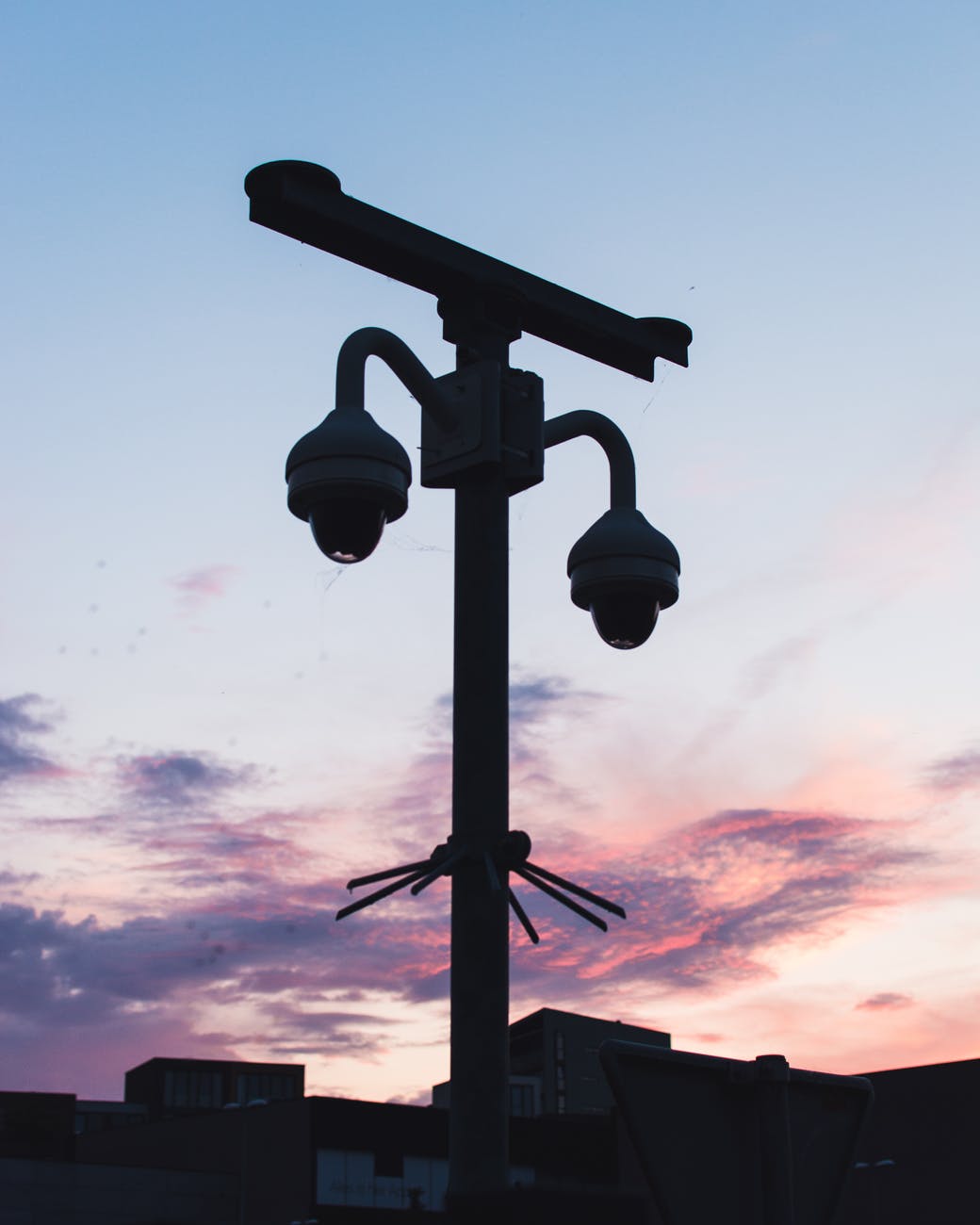 silhouette photo of cctv